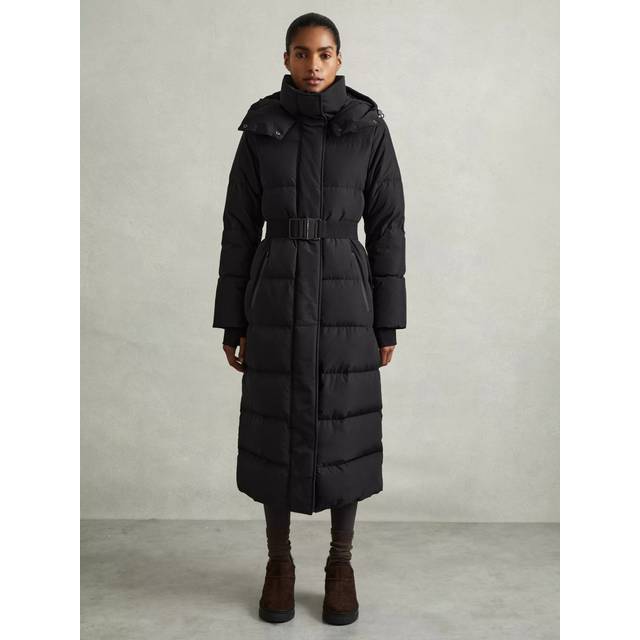 Dalby Longline Hooded Puffer Coat - BLACK - Beginning with men's tailoring in 1970's London, Reiss' design philosophy has endured for over five decades, maintaining the distinctive tailoring, sharp cuts, and contemporary prints it has become famous for to create investment pieces destined to stay in your wardrobe for seasons to come.