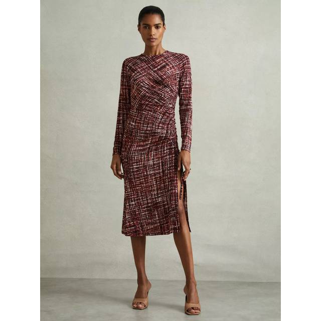 Riyo Printed Ruched Dress - RED - Beginning with men's tailoring in 1970's London, Reiss' design philosophy has endured for over five decades, maintaining the distinctive tailoring, sharp cuts, and contemporary prints it has become famous for to create investment pieces destined to stay in your wardrobe for seasons to come.
