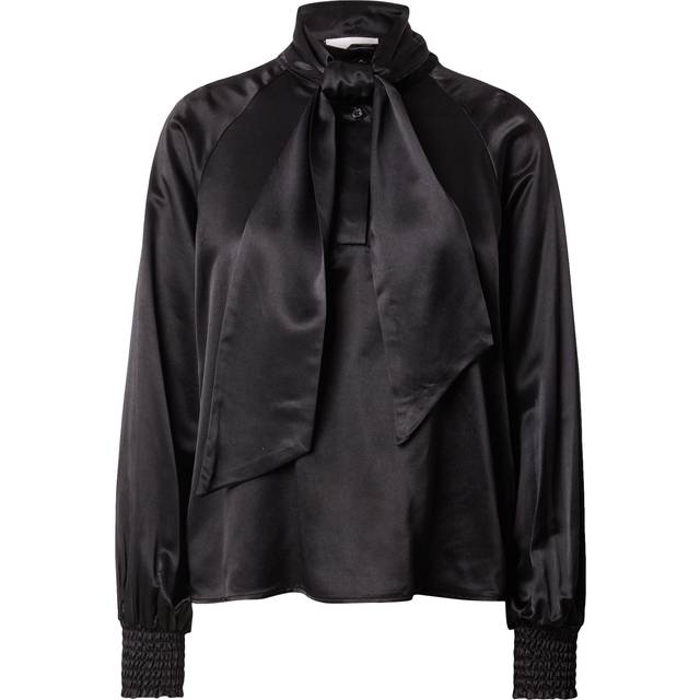 Estelle Bow Blouse - Black - Danish brand MY ESSENTIAL WARDROBE offer a range of wardrobe staples that transcend trends and seasons. Each collection is filled with daily basics, such as denim, outerwear, and minimalistic yet feminine silhouettes that are sure to become favourites in your wardrobe rotation.