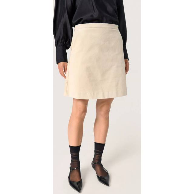 Helle Velvet Mini Skirt - Oatmeal - Copenhagen-based brand Soaked In Luxury champions sophisticated yet accessible style, delivering a range of wardrobe staples each season that showcases the label's refined design aesthetic. Minimalistic every day basics, flowing feminine dresses and tailored workwear are at the core of each collection, all crafted with the purpose of transcending seasons so you get more out of your favourite pieces.