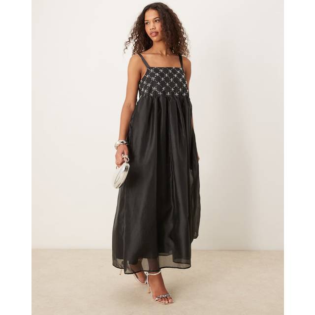 Florence Beaded Dress - BLK - Whimsical details and retro designs are two distinctive features that can be spotted across the creations by Sister Jane. The London-based label specialise in limited-edition clothing and offer a new capsule collection every 6 weeks, keeping your wardrobe fresh and stylish.
