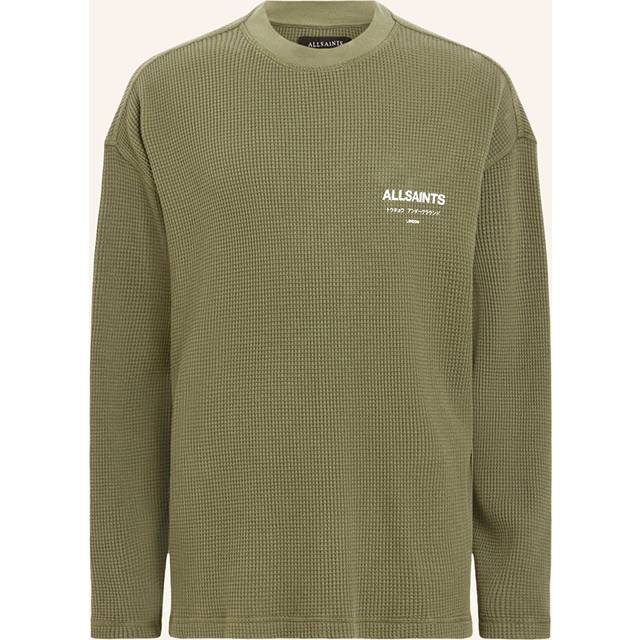Crypt Logo Long-Sleeved T-Shirt - FLEUR GREEN - Founded in London in 1994, AllSaints has been crafting iconic leather pieces for decades. As well as statement jackets, biker boots, and accessories, the brand’s everyday items offer a dose of attitude with distressed detailing, daring prints and the signature Ramskull logo.
