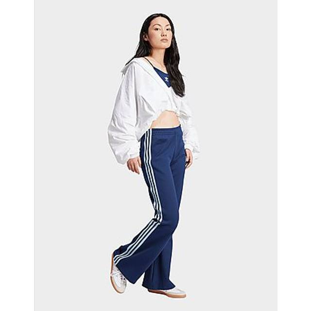 adidas Originals – Adicolor – Mörkblå, utsvängda träningsbyxor med 3 ränder