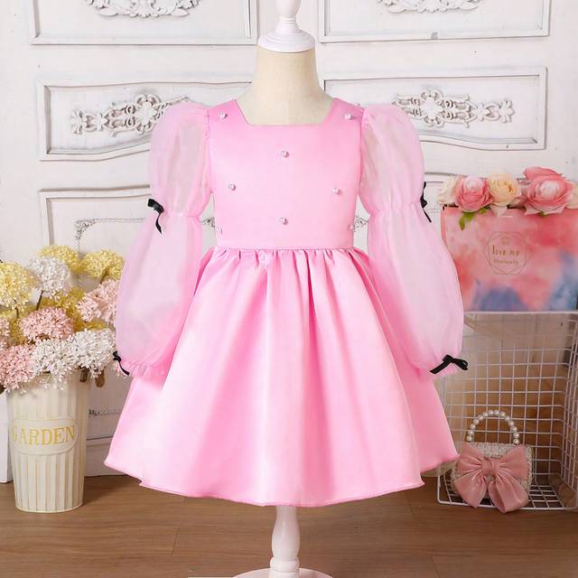 SHEIN Christmas Young Girl Dress, Girls Pink Satin & Mesh Puff Sleeve Bowknot Decor Chiffon Dress. This Dress Features A Woven Pink Satin Material With Pink