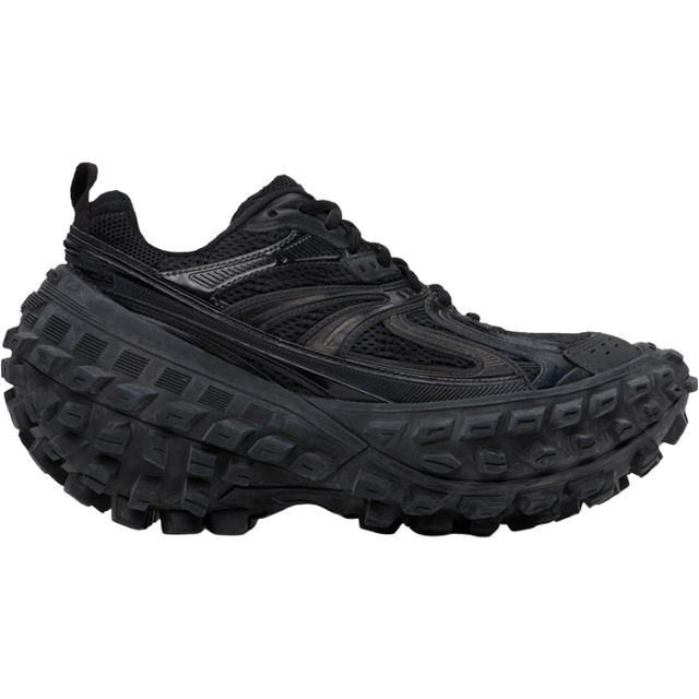 Bouncer Sneakers - Black - <p>Marrying style and innovation, Balenciaga's statement avant-garde footwear never ceases to disappoint. Reminiscent of utility vehicle tires- the Bouncer sneakers work a multi-faceted chunky silhouette with an elegant curve design and sporty mesh and rubber detailing. Engineered for a worn-in look, the Bouncers are sure to elevate any new season edit.</p>