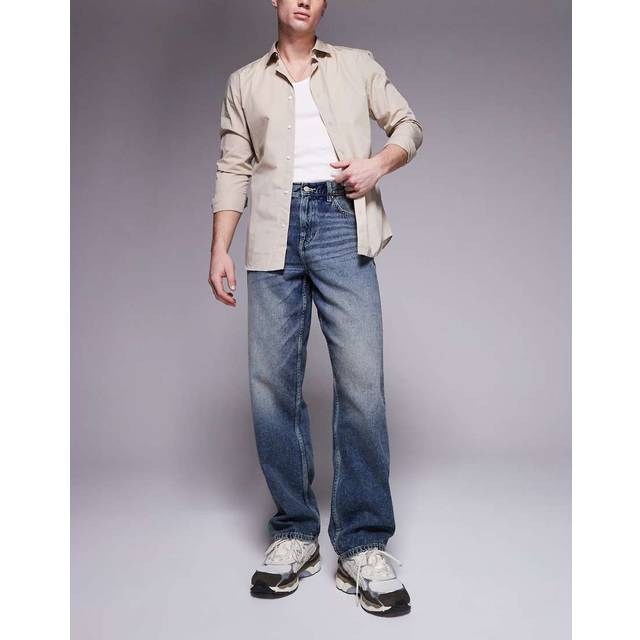 ASOS DESIGN – Mellanblå, baggy jeans med vintagetvätt