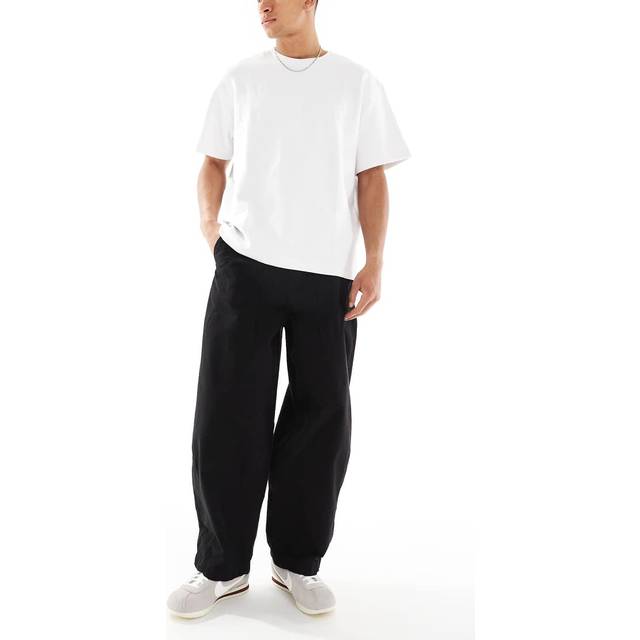 ASOS DESIGN – Svarta, tvättade, baggy jeans i oversize-Svart/a