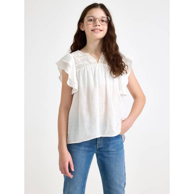 Blus med volang