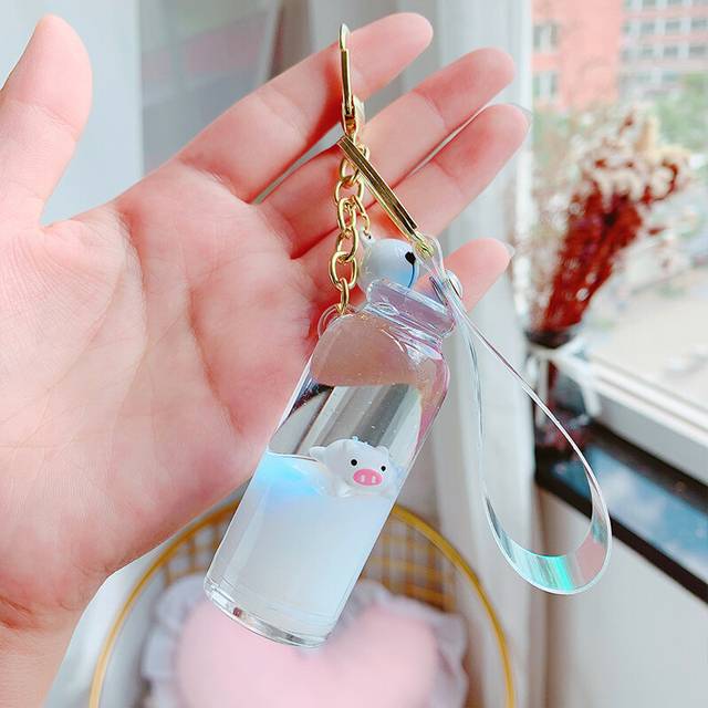 (Milk WhiteWhite) Floating Milk Pig Keychain With Adorable Bell Made Of Durable Acrylic Material