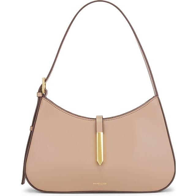 The Tokyo Leather Shoulder Bag - Dark Sand - Founded in 2017 with a vision of empowerment, DeMellier's creations are designed in London and handcrafted by artisans in Europe. Blending heritage and modernity, the name reflects founder Mireia’s Spanish and French roots, capturing tradition and innovation in every design.