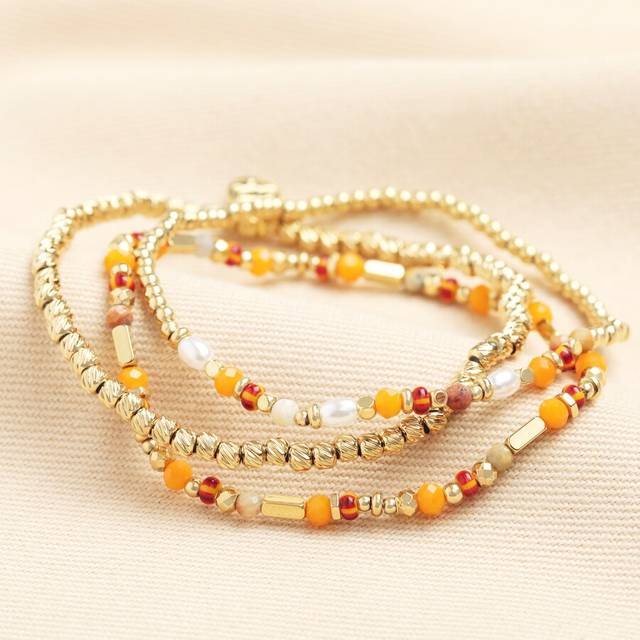Set of 3 Stainless Steel Orange Layered Beaded Bracelets in Gold - gold/orange - one size