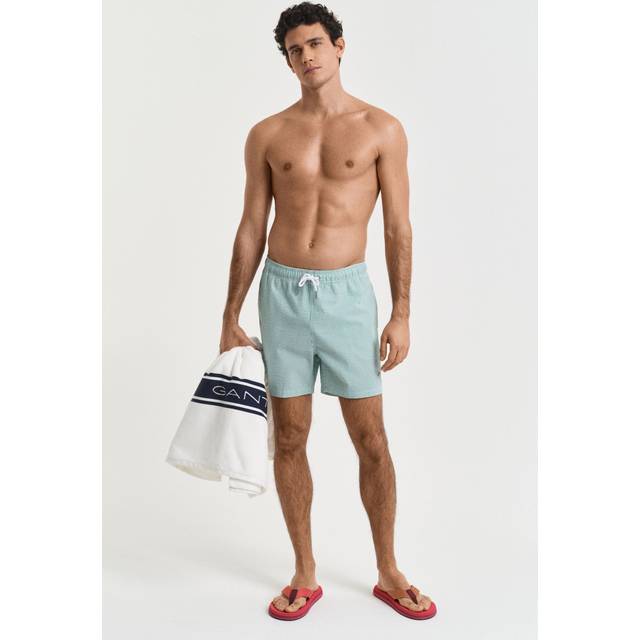 Badshorts i bäckebölja grön