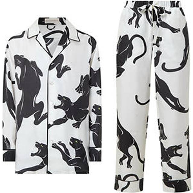 Yves Panther Pyjama Set - ROMAIN Panther Print - Synonymous with reinvention and uncompromising luxury, Olivia von Halle blurs the line between nightwear and ready-to-wear. Inspired by the lounging pyjamas worn by Coco Chanel and her contemporaries in the '20s, the London-based label honours traditional hand embroidery and screen-printing technique to create one-of a-kind designs.