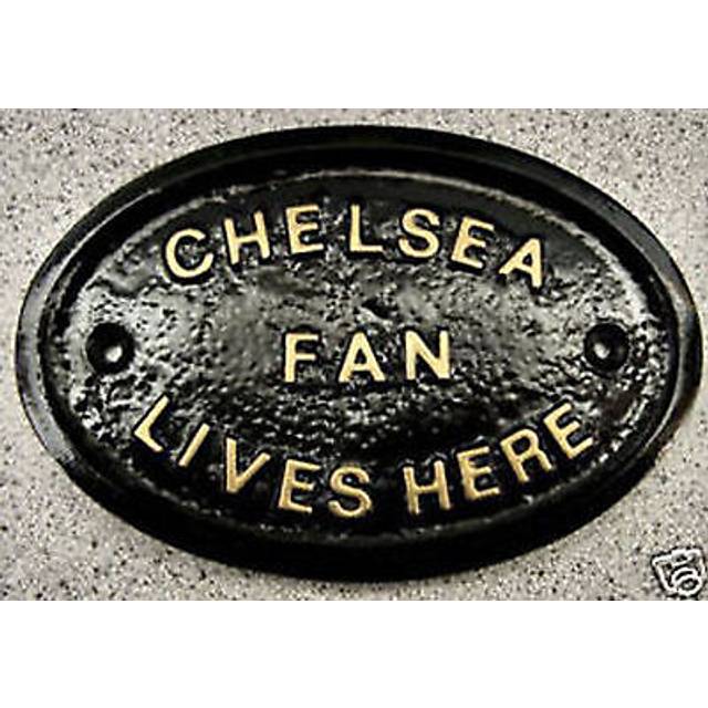 Chelsea house door plaque borough sign gate wall