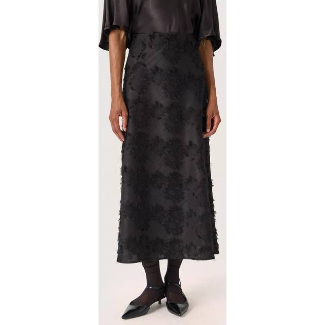 Bettie Anna A-Line Skirt - Black - Copenhagen-based brand Soaked In Luxury champions sophisticated yet accessible style, delivering a range of wardrobe staples each season that showcases the label's refined design aesthetic. Minimalistic every day basics, flowing feminine dresses and tailored workwear are at the core of each collection, all crafted with the purpose of transcending seasons so you get more out of your favourite pieces.