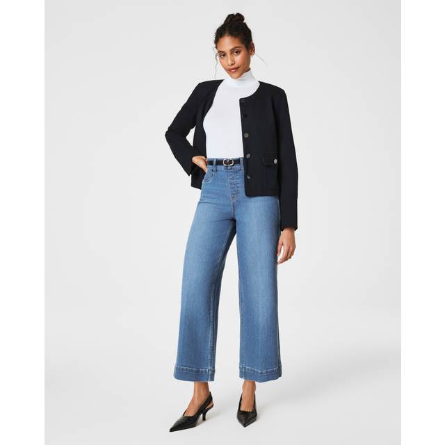 High-Rise Wide Leg Cropped Jeans - Stonewash Blue - Spanx launched in 2000 and after years of success selling shapewear and underwear the brand delved into women’s apparel, which was met with the same level of popularity. From shaping leggings to smoothing t-shirts, the label is the one stop shop for comfortable wardrobe essentials that accentuate the feminine figure.