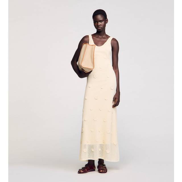 Floral Appliqué Mesh Dress - ECRU - Evelyne and Didier Chetrite founded Sandro in 1984, setting up shop in Paris. The brand's design aesthetic is inspired by Evelyne's childhood in Morocco and classic Parisian chic style, resulting in collections filled with flowing silhouettes, feminine details and vibrant hues and prints. Offering an array of wardrobe staples, occasionwear and accessories, there is something for everyone.