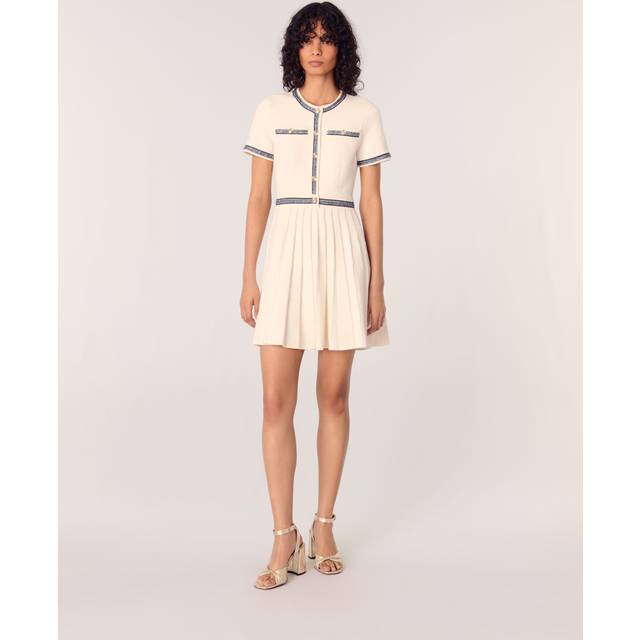 Pleated Knit Mini Dress - ECRU - Maje’s story begins in France in 1998, when Judith Milgrom was inspired by the cosmopolitan Parisian woman to create a brand that celebrates her trend-driven style. Offering collections ranging from ready-to-wear clothing to bags and accessories, each design is enlivened by sharp details to achieve the brand’s signature glamourous, yet bold and understated look.