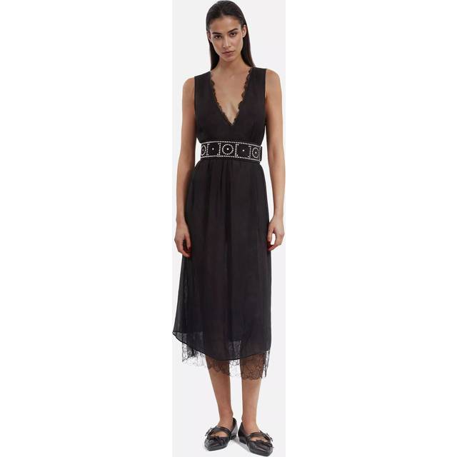 Lace Trim Flared Dress - BLA01 - Rock culture, sharp tailoring and Parisian nights are at the core of the DNA that informs French label The Kooples design aesthetic. Founded in 2008 by the Elicha brothers, each collection largely features wardrobe staples including bohemian dresses, outerwear and everyday basics, that are finished with sleek details offering an edgy aesthetic that the brand is known for.