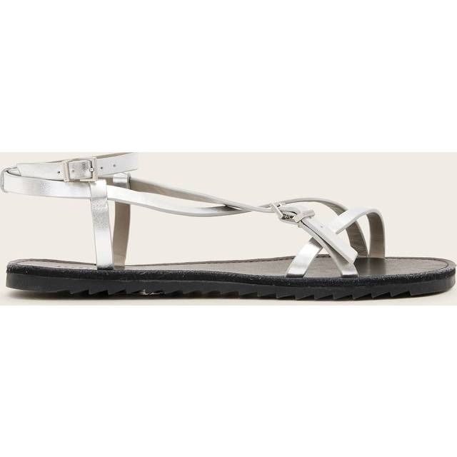 Tyla Flat Sandals - Silver - Founded in London in 1994, AllSaints has been crafting iconic leather pieces for decades. As well as statement jackets, biker boots, and accessories, the brand’s everyday items offer a dose of attitude with distressed detailing, daring prints and the signature Ramskull logo.