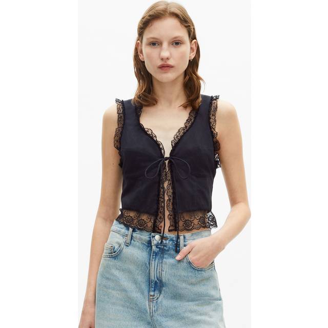 Lace-Trim Cropped Vest - BLA01 - Rock culture, sharp tailoring and Parisian nights are at the core of the DNA that informs French label The Kooples design aesthetic. Founded in 2008 by the Elicha brothers, each collection largely features wardrobe staples including bohemian dresses, outerwear and everyday basics, that are finished with sleek details offering an edgy aesthetic that the brand is known for.