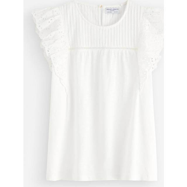 Topp med broderie anglaise