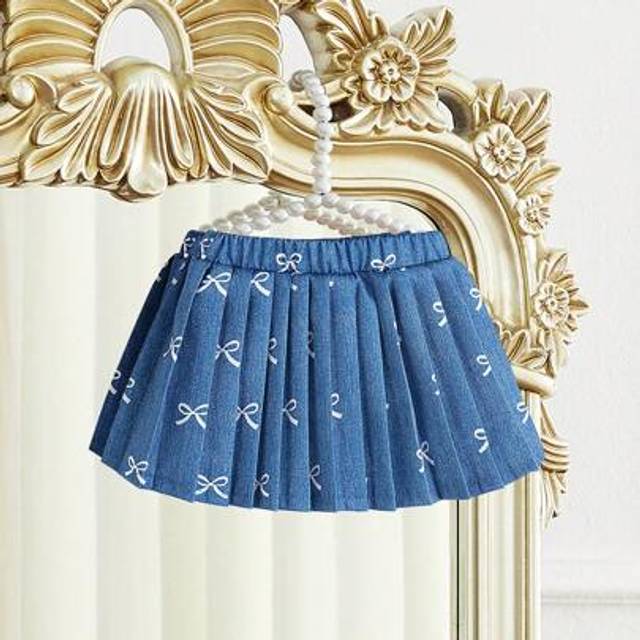 SHEIN Bowknot-Printed Pleated Short Skirt For Baby Girls. Newly Launched, It Is Cute, Comfortable, Fashionable And Sweet, And Is A Must-Have For Daily Wear