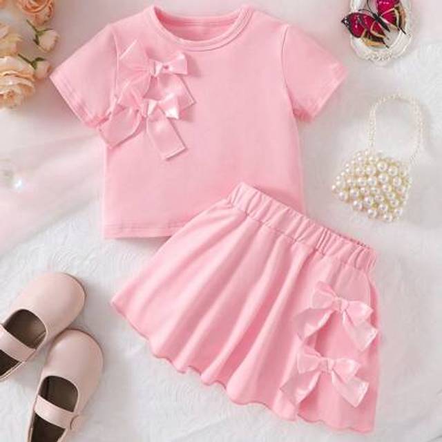 SHEIN 2pcs Baby Girls&#39; Ribbon & Bow Decor Round Neck Short Sleeve Solid Color T-Shirt + Elastic Waist Skirt Set, Comfortable, Soft, Fashionable & Cute, Spri