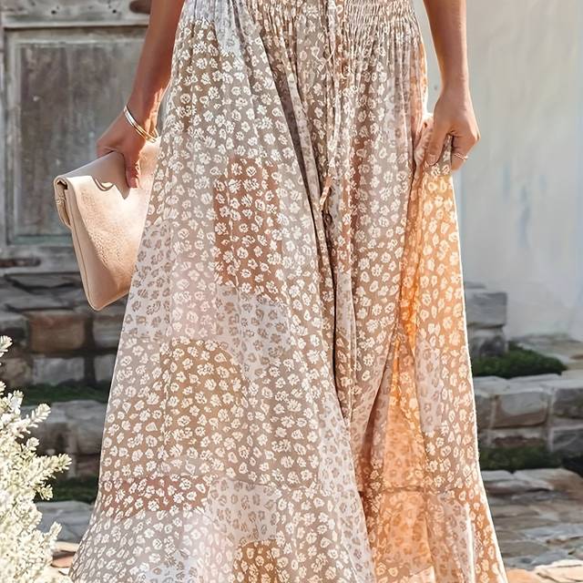 TEMU A Long Skirt With A Pleated Waist And Button Detail Featuring A Directional Floral Pattern.