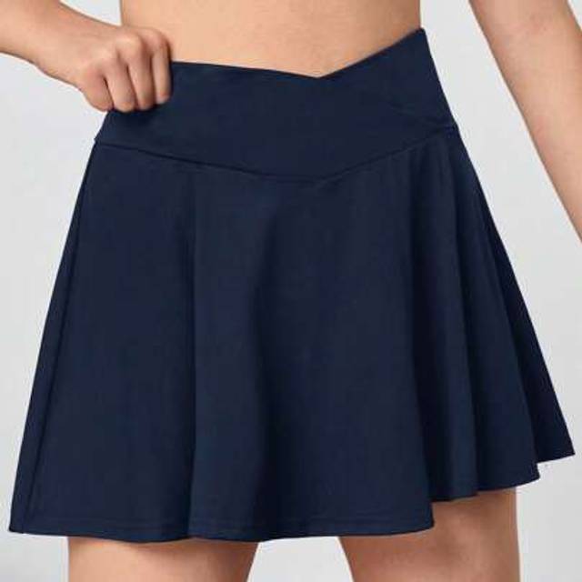 SHEIN Teen Girls&#39; Solid Color Knitted Anti-Flashing Hidden Pocket Skorts With V-Waist, Casual Sport Skorts