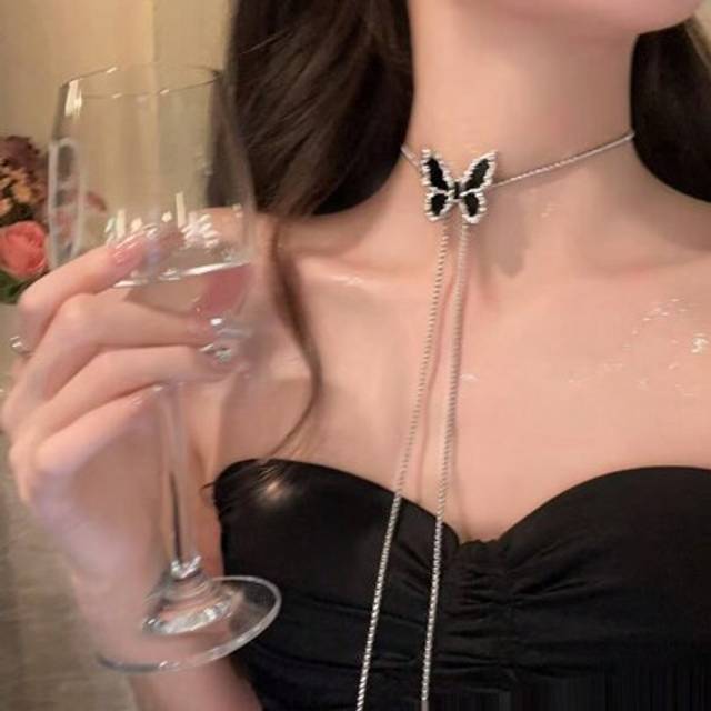 SHEIN A Stylish Black Butterfly Drawstring Long Necklace Suitable For Daily Wear By Girls.