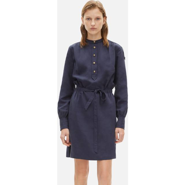 Tie-Fastening Mini Shirt Dress - NAV01 - Rock culture, sharp tailoring and Parisian nights are at the core of the DNA that informs French label The Kooples design aesthetic. Founded in 2008 by the Elicha brothers, each collection largely features wardrobe staples including bohemian dresses, outerwear and everyday basics, that are finished with sleek details offering an edgy aesthetic that the brand is known for.