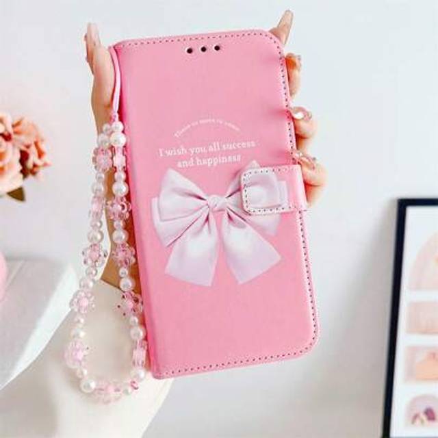 SHEIN Peach Large Bow Faux Pearl Decor Wristband Case Compatible With IPhone 16, IPhone 16 Pro, IPhone 16 Plus, IPhone 16 Pro Max, Galaxy S25 Ultra, Galaxy