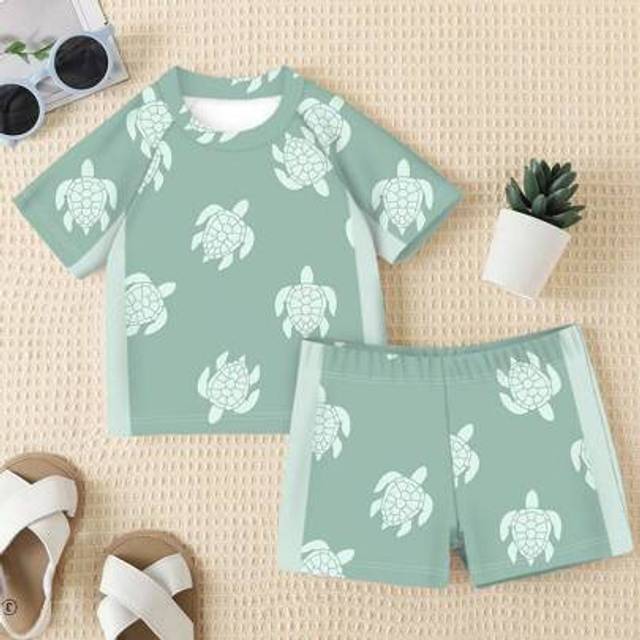 SHEIN Baby Boy Casual Slim-Fit Cute Cartoon Turtle Graphic Print Short Sleeve T-Shirt And Shorts Swimming Suit Set, Suitable For Summer