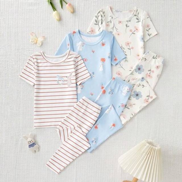 SHEIN Young Girl 6-Piece Snug Fit Short Sleeve Top And Long Pants Pajama Set. This Pajama Set Is Suitable For Young Girls To Wear Casually At Home. It Can B