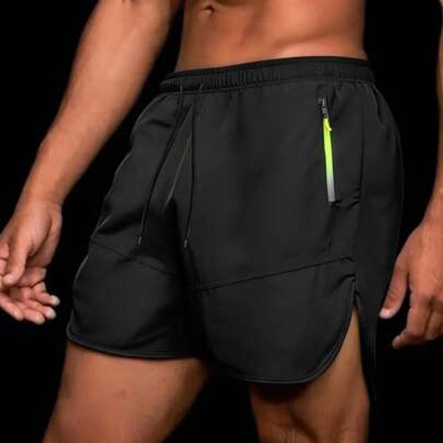 SHEIN Men&#39;s Drawstring Waist Zip Pocket Loose Casual Sports Shorts