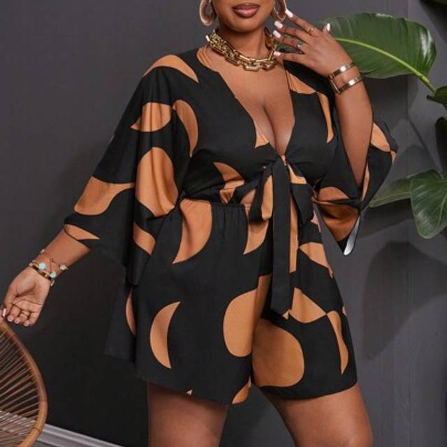 Slaydiva Plus Size Women Holiday Casual V-Neck Loose Printed Jumpsuit With Tie Belt