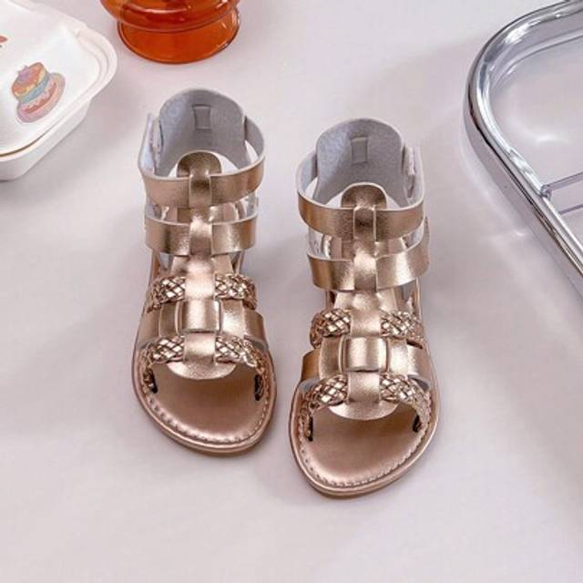 SHEIN A Pair Of Best-Selling Children&#39;s /2025 New Girls&#39; Sandals Features A Rose Gold Leather Upper And A Multi-Strap Cross-Woven Design, Presenting A Roman