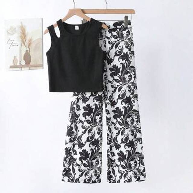 SHEIN 2pcs/Set Teen Girls&#39; Solid Color Round Neck Camisole Top And Green Floral Printed Wide Leg Flare Pants Set, Elegant Resort Wear