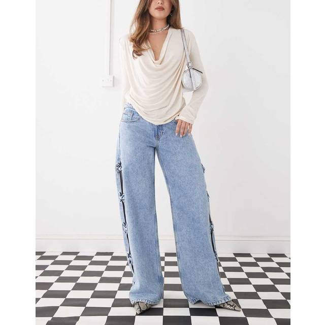 Monki – Imoo – Ljusblå, tvättade jeans med vida ben, låg midja och utskurna detaljer
