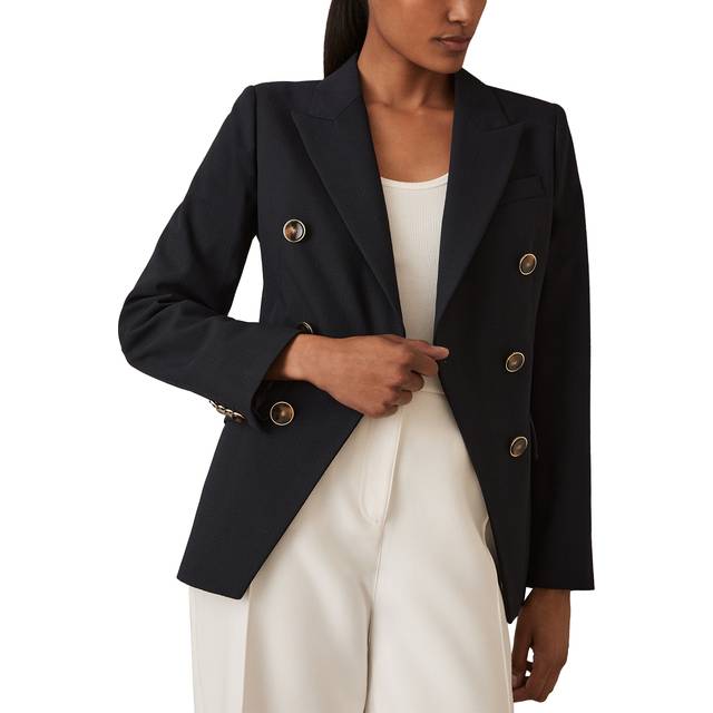 Lia Double-Breasted Blazer - Navy - Beginning with men's tailoring in 1970's London, Reiss' design philosophy has endured for over five decades, maintaining the distinctive tailoring, sharp cuts, and contemporary prints it has become famous for to create investment pieces destined to stay in your wardrobe for seasons to come.