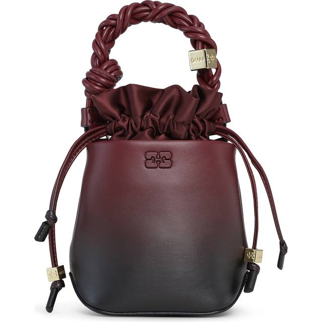 Bou Mini Gradient Bucket Bag - Tawny Port - Embracing its Nordic heritage without limiting itself to traditional minimalism, Ganni seeks a more effortless and playful approach to design. Leaving plenty of room for experimentation, the label's fresh approach to femininity injects bold colour palettes and comfortable fits into your everyday wardrobe.