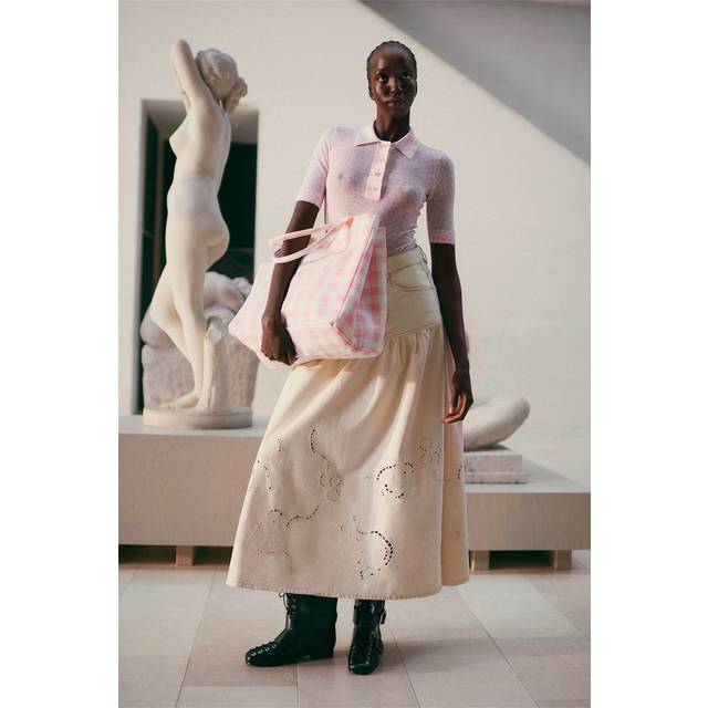Egret Broderie Denim Skirt - Embracing its Nordic heritage without limiting itself to traditional minimalism, Ganni seeks a more effortless and playful approach to design. Leaving plenty of room for experimentation, the label's fresh approach to femininity injects bold colour palettes and comfortable fits into your everyday wardrobe.