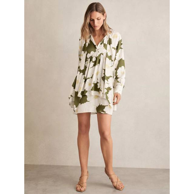 Neva Floral Tie-Neck Flared Dress - Ivory/Green - Beginning with men's tailoring in 1970's London, Reiss' design philosophy has endured for over five decades, maintaining the distinctive tailoring, sharp cuts, and contemporary prints it has become famous for to create investment pieces destined to stay in your wardrobe for seasons to come.