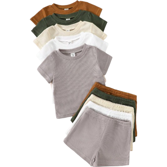 SHEIN 5pcs Toddler Boys Outfits Set, Including 5 Textured Knit Short Sleeve Round Neck Tops And 5 Elastic Waist Textured Knit Shorts. The Top Colors Are Kha