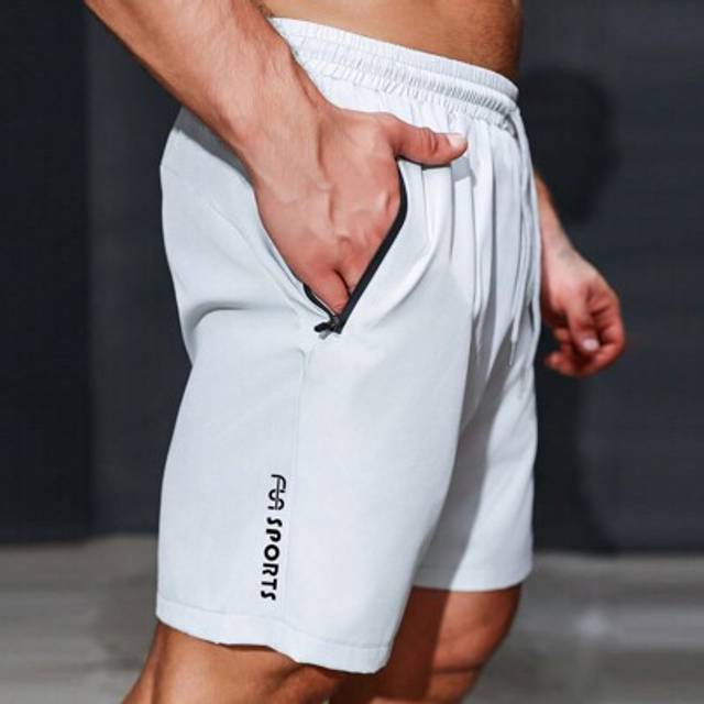 SHEIN Sport Boyfriend Style Men Letter Graphic Zipper Pocket Sports Stretchy Shorts