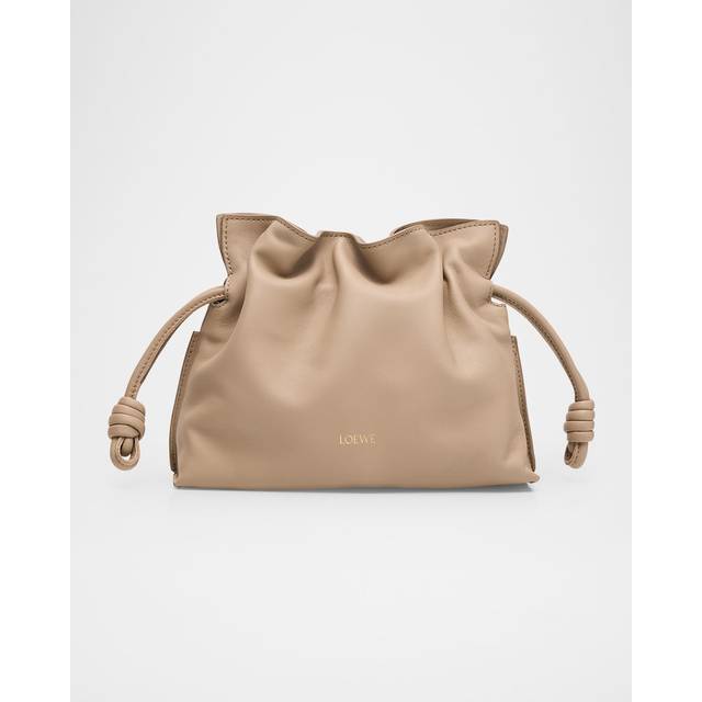 Flamenco Mini Clutch - Sand - Since its early beginnings, LOEWE has been strongly associated with leather craftsmanship. This reputation continues today with the Spanish label creating statement-making accessories to complete your looks.