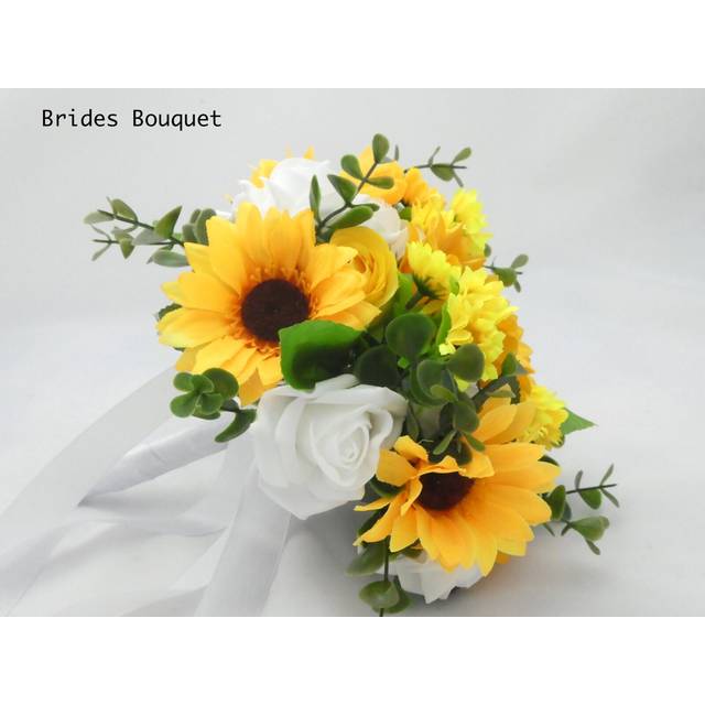 Brides bouquet flowers in yellow & white roses and sunflowers