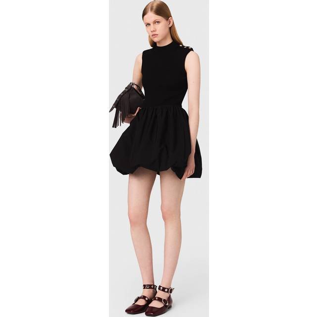 Rib-Knit Mini Bubble Dress - Black - Maje’s story begins in France in 1998, when Judith Milgrom was inspired by the cosmopolitan Parisian woman to create a brand that celebrates her trend-driven style. Offering collections ranging from ready-to-wear clothing to bags and accessories, each design is enlivened by sharp details to achieve the brand’s signature glamourous, yet bold and understated look.