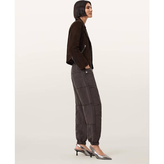 Val Tapered Leg Cargo Trousers - Dark Brown - Founded in London in 1994, AllSaints has been crafting iconic leather pieces for decades. As well as statement jackets, biker boots, and accessories, the brand’s everyday items offer a dose of attitude with distressed detailing, daring prints and the signature Ramskull logo.